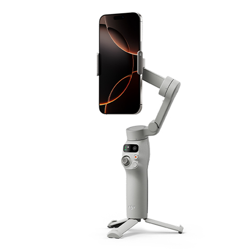 A compact DJI Osmo Mobile 7 smartphone gimbal stabilizing a smartphone, featuring a retractable extension rod, magnetic phone clamp, and 3-axis stabilization for smooth video recording and photography.