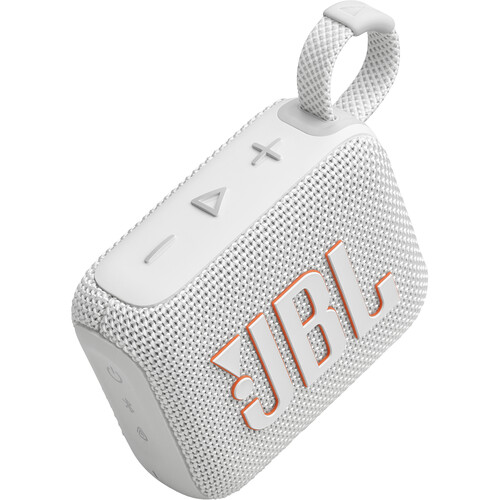 A compact red JBL Go 4 portable Bluetooth speaker with a fabric-covered design, rubberized edges, and a built-in carrying loop, resting on a flat surface.