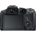 A Canon EOS R7 mirrorless camera with a black body and a mounted lens, placed on a flat surface, showcasing its sleek design and professional features.