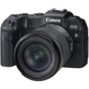 Canon EOS RP full-frame mirrorless camera with RF 24-105mm f/4-7.1 IS STM lens, displayed on a table with accessories.