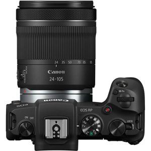 Canon EOS RP full-frame mirrorless camera with RF 24-105mm f/4-7.1 IS STM lens, displayed on a table with accessories.