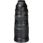 A close-up of the Nikon AF-S NIKKOR 200-500mm f/5.6E ED VR telephoto zoom lens, showcasing its large barrel, zoom ring, and gold 'NIKKOR' branding. The lens is mounted on a Nikon DSLR camera, ready for action photography.