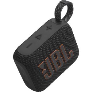 A compact red JBL Go 4 portable Bluetooth speaker with a fabric-covered design, rubberized edges, and a built-in carrying loop, resting on a flat surface.