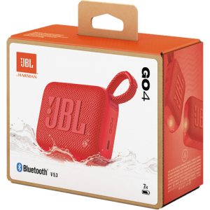 A compact red JBL Go 4 portable Bluetooth speaker with a fabric-covered design, rubberized edges, and a built-in carrying loop, resting on a flat surface.