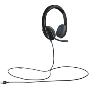 A sleek black Logitech® H540 USB Computer Headset with padded ear cushions, an adjustable headband, and a noise-canceling microphone, resting on a desk with a USB cable connected.