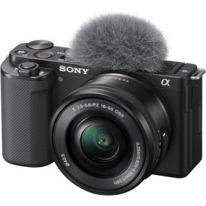 Black Sony ZV-E10 mirrorless vlogging camera with retractable 16-50mm lens, tilted screen, and built-in microphone.