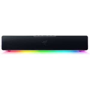 Razer Leviathan V2 X PC Gaming Soundbar on a sleek setup with RGB lighting, perfect for immersive gaming and audio experiences.