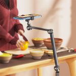 Phone Holder Stand 360 Rotatable Flexible Base clamped to a desk at Camera Stuff Kenya.
